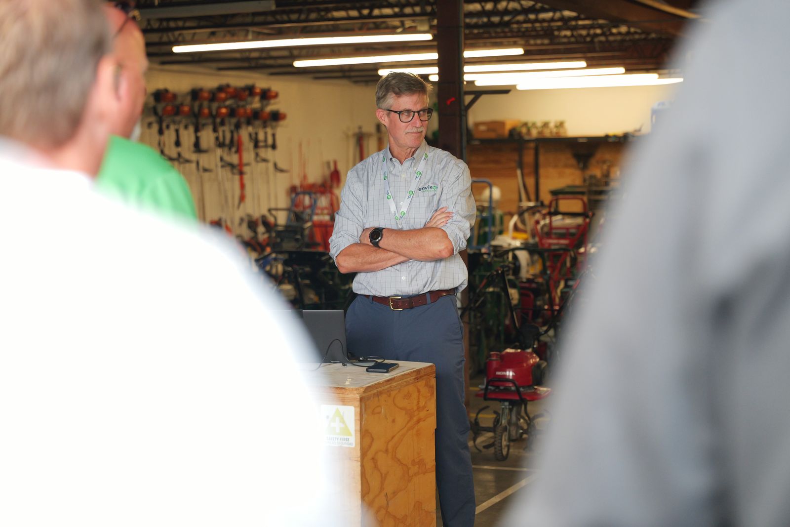 Ben Gandy leading a tour through Greenhall’s equipment shop